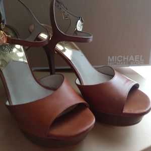 Two pairs of MK heels